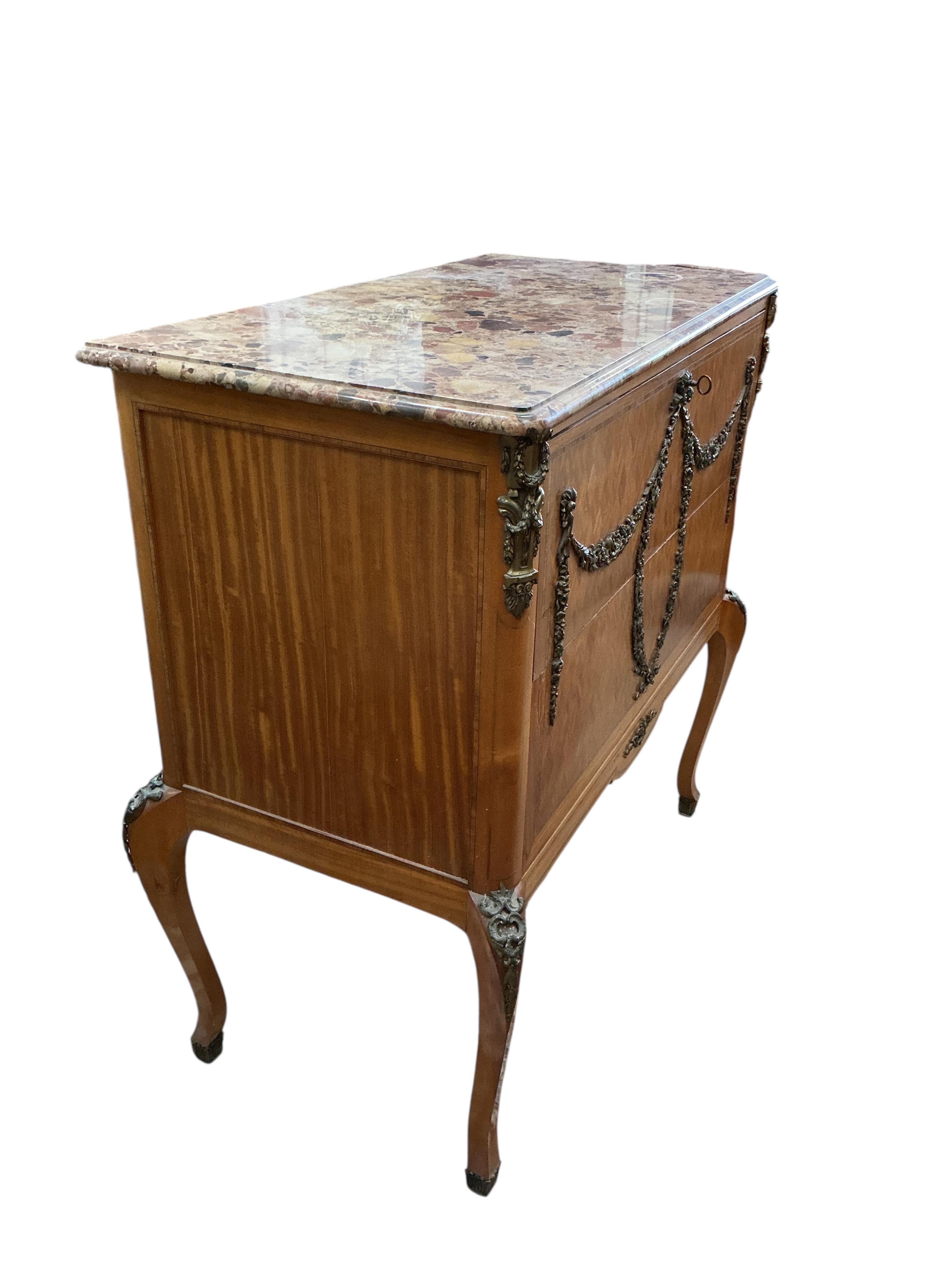 An early 20th century French transitional style gilt metal mounted parquetry inlaid marble top secretaire chest, width 99cm, depth 50cm, height 101cm